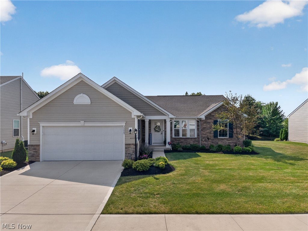 Welcome to this beautifully maintained, move-in ready ranch in the highly desirable Mallards Edge community—offering all the perks of a new home without the wait. Located next to Mallard Creek Golf Course, this 3-bedroom, 3-bath home is looking for its next family. From the moment you step inside, you'll love the bright, open layout, stylish lighting, and designer finishes. The stunning kitchen is the heart of the home, featuring granite countertops, a huge center island, stainless steel appliances, and timeless white cabinetry—perfect for entertaining or everyday living. The thoughtfully designed floor plan offers privacy with the owner's suite tucked away on one side of the home and oversized walk-in closet, while two additional bedrooms and a full bath are located on the opposite side. Step outside and enjoy your brand-new maintenance-free deck with retractable awning overlooking the peaceful pond with fountain—an ideal spot for morning coffee or relaxing summer evenings. Need more space? The finished lower level delivers! You'll find a huge family room that's perfect for movie nights, game days, or entertaining, plus another room currently used as an office with a third full bathroom, and plenty of unfinished storage space. This home truly checks all the boxes—first-floor living, modern finishes, extra space, and an unbeatable location. The only thing left to do is unpack and start enjoying everything this incredible home has and don't forget your clubs! Still shines like a new penny!!