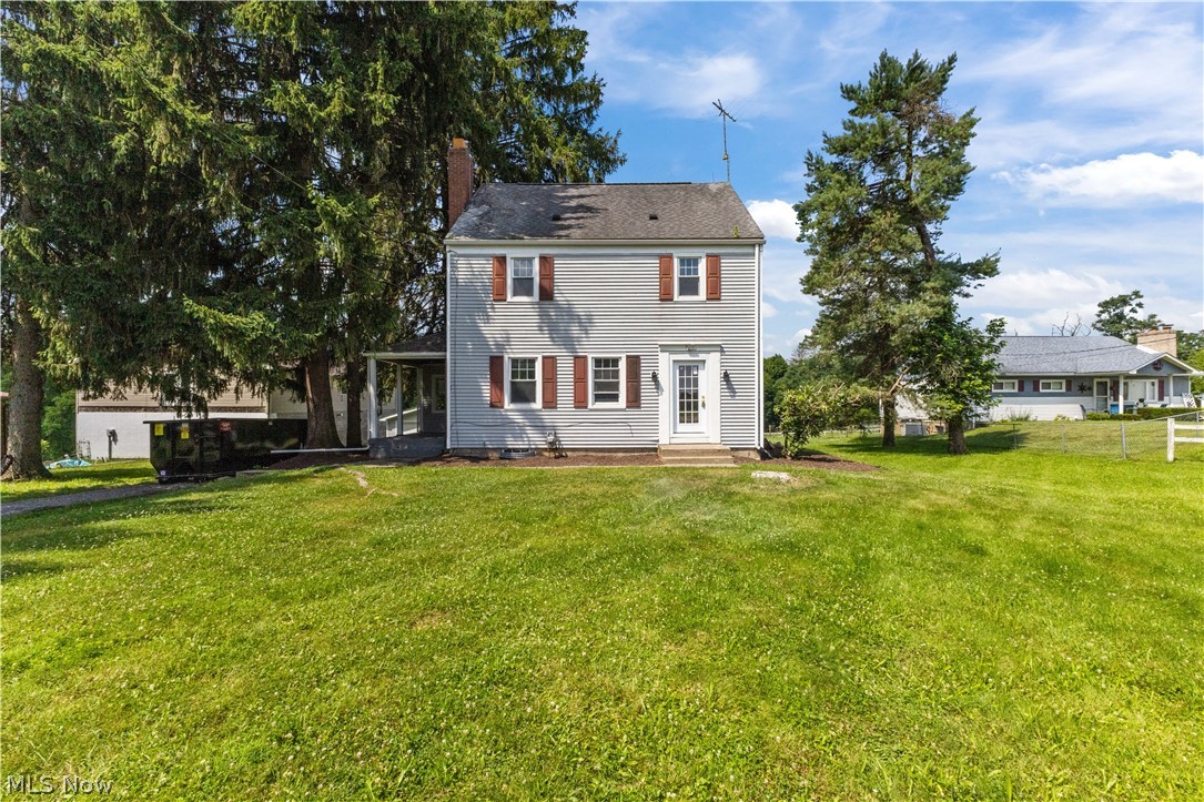 Charming colonial home, just seconds from the WV/PA border. This Home welcomes you into a large living room that flow seamlessly into a dining room room with custom built ins. From there, you’re taking into the galley kitchen with granite countertops. Off the kitchen, you’ll find a first floor, laundry room, and pantry off the kitchen as a covered patio perfect for relaxing evenings. The main level also features a powder room. Upstairs, you will find three large bedrooms, a full bathroom and a bonus room. The large basement is perfect for expansion and also features A 1 car garage. outside you will find a detached two car garage and a large flat backyard.