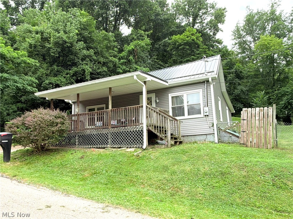 Attention investors, flippers, and buyers looking for a home with potential! Located at 349 Fishers Lane in Zanesville, this 2-bedroom, 1-full-bath property offers an incredible opportunity to bring your vision to life. Whether you’re looking to add to your investment portfolio, take on your next renovation project, or purchase a home you can personalize, this property is full of possibilities.
Featuring convenient main-floor laundry, an updated kitchen, recently replaced roof and siding, and a beautiful covered front porch stretching the width of the home, this property already has several key improvements in place. Situated on a spacious parcel tucked away from the noise of the city, it offers a peaceful setting that's hard to find while still being close to all the conveniences of town.
Finding a property with this kind of peaceful setting while still being in town is a rare opportunity. Don’t miss your chance to explore the possibilities this home has to offer!