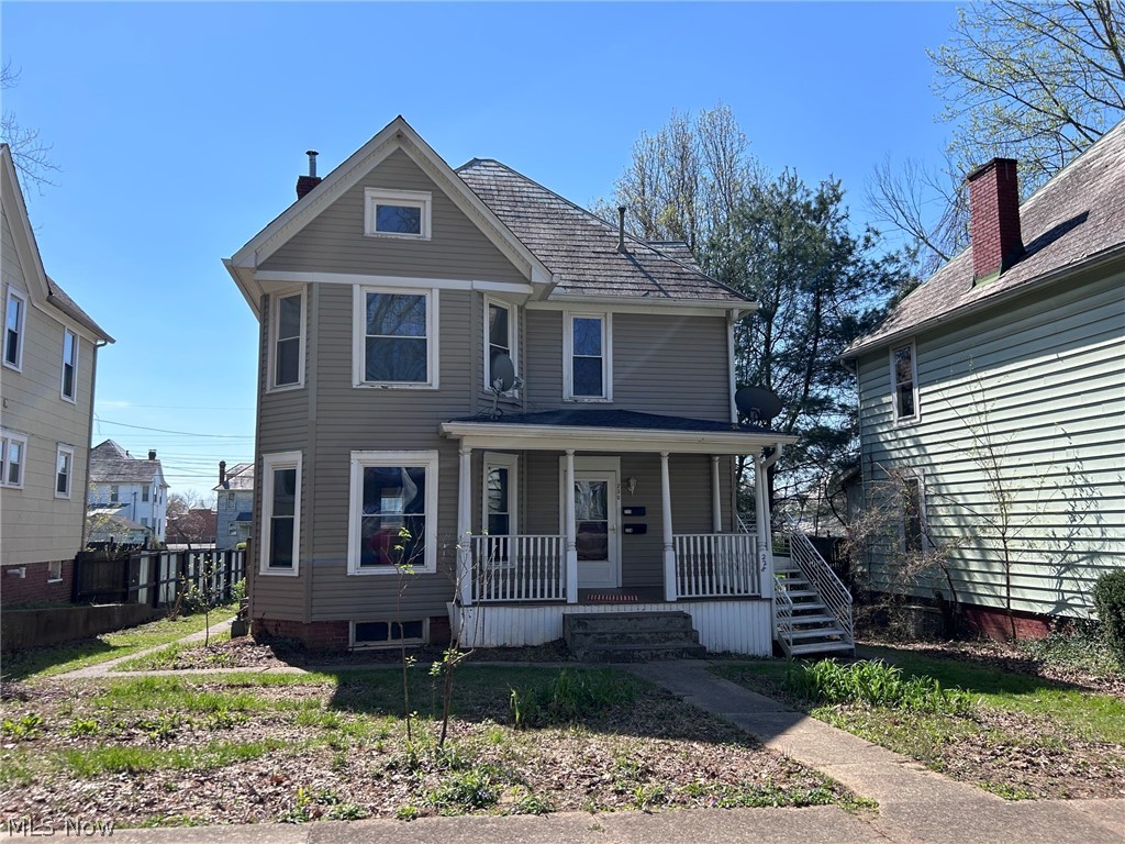 Great investment opportunity with this well-maintained duplex offering both character and potential! The owner has occupied the lower level, while the upper unit—though not rented for many years—has been maintained and remains in good condition just needs some updating. The first-floor unit showcases beautiful original hardwood floors, classic pocket doors, two stunning decorative fireplaces with original mantels and tile, and a charming built-in china hutch—perfectly blending historic character with everyday functionality. The upper unit offers additional living space with solid bones and has been preserved over the years, though it will require an updated heat source to be fully utilized. A full walk-up attic provides exciting potential for additional finished space.  The basement includes laundry hook-ups for both units, adding convenience for tenants. Utilities are separately metered, making this an ideal income-producing property. Exterior features include vinyl siding and replacement windows for low maintenance.  Alley access provides off-street parking, along with additional street parking. Whether you’re looking to owner-occupy or expand your investment portfolio, this property offers flexibility, charm, and opportunity!