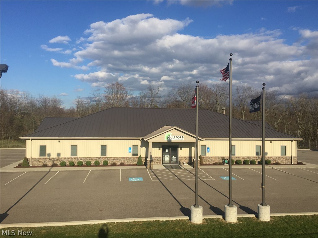 Beautiful Craftsman Style 5712 Square Foot Commercial building built in 2013.  Fantastic location just off of I-70 Exit 213 with access to Route 40 & Route 331. Office building features large reception area, 20 offices, conference room and large kitchen/break room.  Building could easily accommodate several businesses.  Separate parcel included that consists of 1.346 acres that could be surveyed off to sell or expand for future growth of buyer. MINERALS DO NOT CONVEY/PREVIOUS SELLER RETAINED