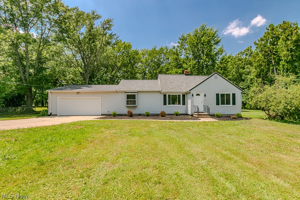 Welcome to your dream home in Willoughby Hills! Perfectly situated on just under an acre, this stunning, quality-renovated property has been thoughtfully transformed from top to bottom and is ready to impress. From the moment you arrive, you'll appreciate the home's inviting curb appeal with its newer roof, garage door, exterior doors, shutters, and updated lighting. Every detail has been carefully selected to create a fresh, modern look. Step inside to discover a bright, open-concept floor plan featuring newer windows (except two), luxury vinyl flooring, carpet, recessed lighting, and updated interior doors throughout. The show-stopping kitchen is the heart of the home, boasting gorgeous Quartz countertops, soft-close cabinetry and drawers, and an effortless flow into the dining and living areas—perfect for entertaining family and friends. Every bathroom has been completely renovated with stylish, contemporary finishes, and the addition of a new upstairs full bath adds comfort and convenience for today's lifestyle. This .98 acre property offers endless possibilities for outdoor living, recreation, gardening, or creating your own backyard oasis. This is more than a renovation—it's a home you'll fall in love with the moment you walk through the door. Don't miss your opportunity to experience everything this incredible Willoughby Hills property has to offer!