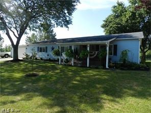 Exceptional, Recently remodeled Spacious Ranch on that is situated on a ONE OF A KIND/NATURE LOVERS lot that is lake front with over $90K invested in the last couple of years! Newer vinyl siding, windows, doors, storage sheds, and more. This home sits on a large lake that can be fished from your back yard which is fenced and includes a 3 season sunroom to watch the ducks, geese, swans, turtles, etc from. Attached 2 car garage. Enter to huge rooms along with an updated kitchen that includes newer appliances that are included, newer gleaming laminate wood flooring and so much more...Call today you will love it:)