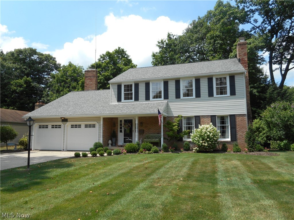 This fantastic property will "WOW" you when you pull in the driveway....this is the one you have been waiting for!  Looking for quality?  This home features an awesome layout, beautiful updates, 6 panel solid wood doors, and is well maintained with absolutely nothing to do.  Hardwood floors throughout most of the home.  Spacious living room with fireplace leads you to the formal dining room (both with crown molding).  Updated eat-in kitchen offers plenty of cabinet space, quartz countertops, newer Samsung SS appliances & pantry.  Sliders off the kitchen open to a fabulous screened-in porch with access to nice patio and awesome backyard overlooking Mud Brook.  The inviting fireplaced family room offers an additional door to the screened-in porch.  First floor powder room has been updated with quartz countertop, flooring & fixtures.  The 2nd floor features 4 spacious bedrooms with nice closet space & a  main full bath w/some updates.  Relax & recharge in the spacious master bedroom with