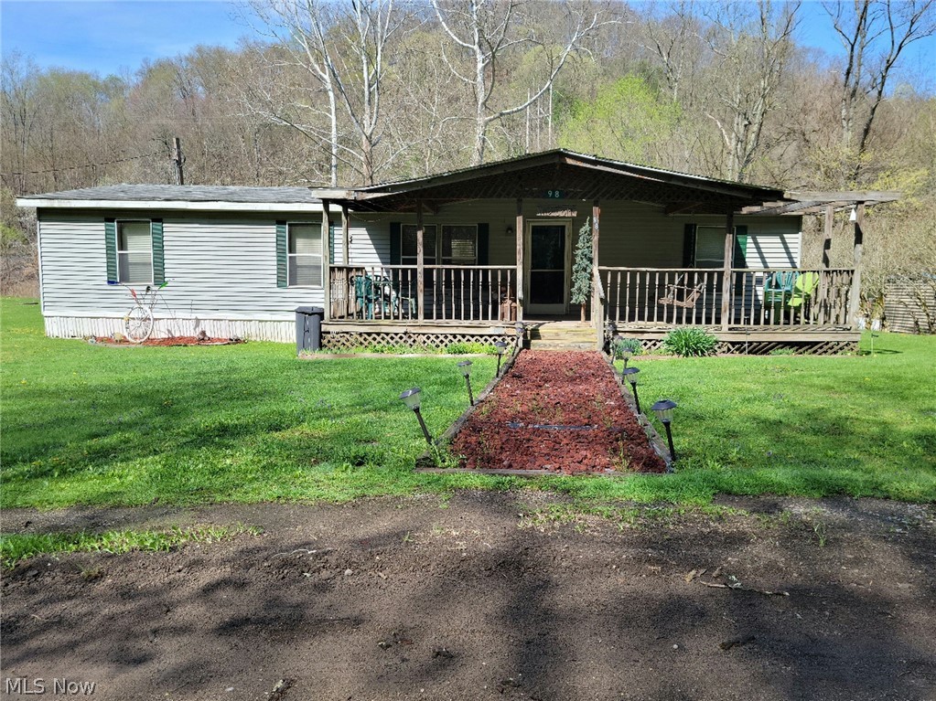 Double-wide mobile home on two parcels located in Irondale, OH.  Both parcels will be sold as one at live auction on Thursday, June 10, 2021 at 5PM. One master bedroom with bathroom.  Two additional bedrooms.  One additional bathroom.  Spacious living room/dining area.  Laundry room located off of the kitchen.  The mobile home will need a new roof and some work done on the floor in the bathroom.  Major appliances are selling with the property; washer, dryer, refrigerator, range.  The front porch is 28x9 and the back deck is 15x12.  There is a flat back yard with a storage shed, and the property borders Yellow Creek.  Real estate will sell as is, where is, and will sell subject to confirmation of the owners. Deposit of $1500 due day of auction. Balance due in 30 days.