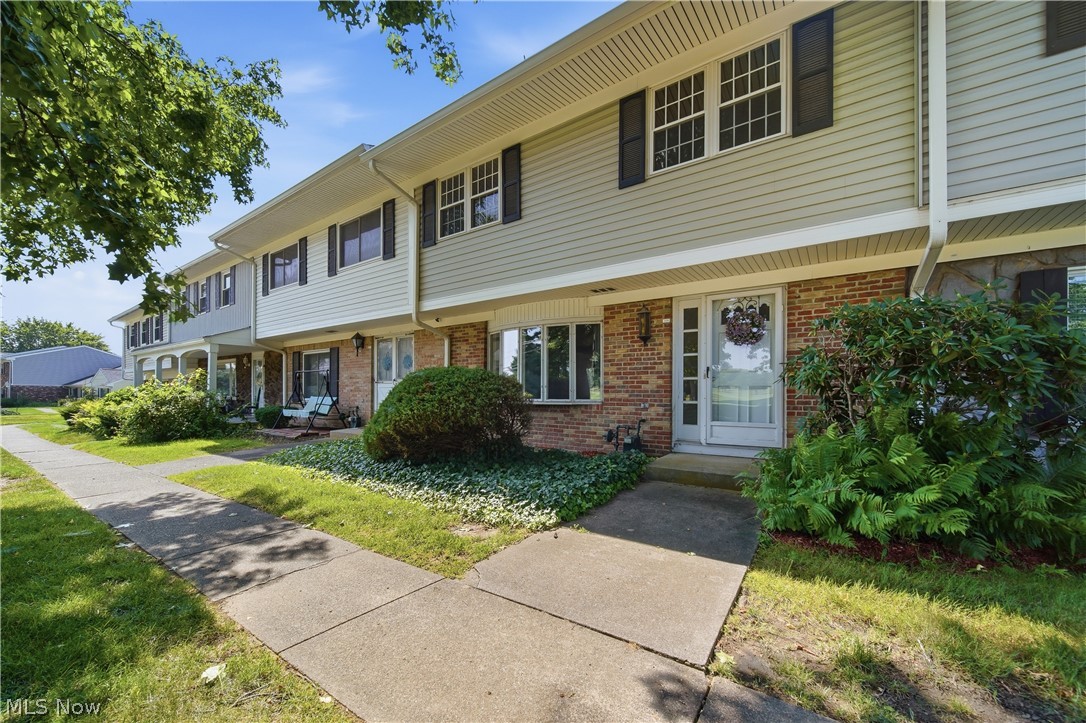 Here's a rare opportunity to own this spacious 1,680 sq. ft. condo featuring an open floor plan designed for comfortable everyday living and entertaining. The inviting carpeted great room offers plenty of space to relax and is highlighted by a large picture window that fills the room with natural light. Adjacent to the great room is a versatile area that can accommodate a formal dining table, home office, reading nook, or additional seating. The laminate-floored dining area easily fits a generously sized table and is brightened by two side-by-side windows. The adjoining kitchen features abundant cabinetry, a convenient breakfast bar, and includes all appliances—including the refrigerator, range, dishwasher, washer, and dryer.Step through the back door onto a large deck overlooking a small garden area, providing the perfect setting for outdoor dining or quiet mornings. A convenient hallway leads to the laundry area and a half bath. Residents enjoy access to the community clubhouse and swimming pool, ideal for entertaining guests or hosting larger gatherings. For added peace of mind, the seller is providing a prepaid home warranty for the buyer. Conveniently located near I-77, this home offers easy access to both Akron and Canton. The $275 monthly maintenance fee covers: trash removal, swimming pool, clubhouse, building insurance, exterior maintenance, snow removal, driveways and parking areas, reserve fund, roof maintenance, lawn care, and more! Don't miss this exceptional value—schedule your private showing today!