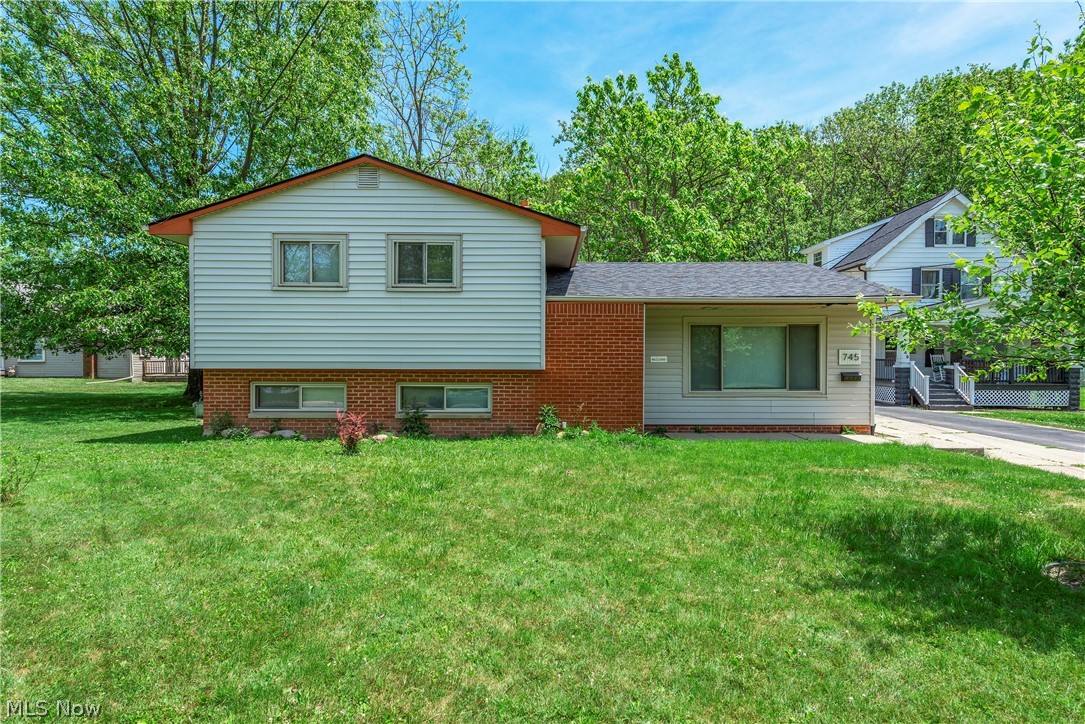 Welcome home to 745 Wellmon Street in Bedford! If you've been searching for a move-in ready home with major updates already completed, this is the one you've been waiting for. This beautifully updated 4-bedroom, 2-full-bath split-level offers the perfect blend of comfort, style, and functionality. From the moment you walk in, you'll appreciate the fresh, modern feel featuring a brand-new kitchen, updated bathrooms, new flooring, fresh paint, updated lighting, and so much more. The roof has also been updated, giving you added peace of mind for years to come. The split-level design provides plenty of space for everyone, with flexible living areas that are ideal for families, guests, a home office, or simply spreading out and enjoying your own space. Step outside and you'll find one of the home's standout features—a deep backyard that backs to a wooded area, creating a private and peaceful setting that's hard to find. Whether you're entertaining, gardening, or simply relaxing, you'll love the extra outdoor space and natural backdrop. The home also includes a two-car garage and is conveniently located near shopping, dining, parks, and major highways, making everyday living easy and accessible. With its extensive updates, spacious layout, and beautiful backyard setting, 745 Wellmon is truly move-in ready and waiting for its next owner to call it home.