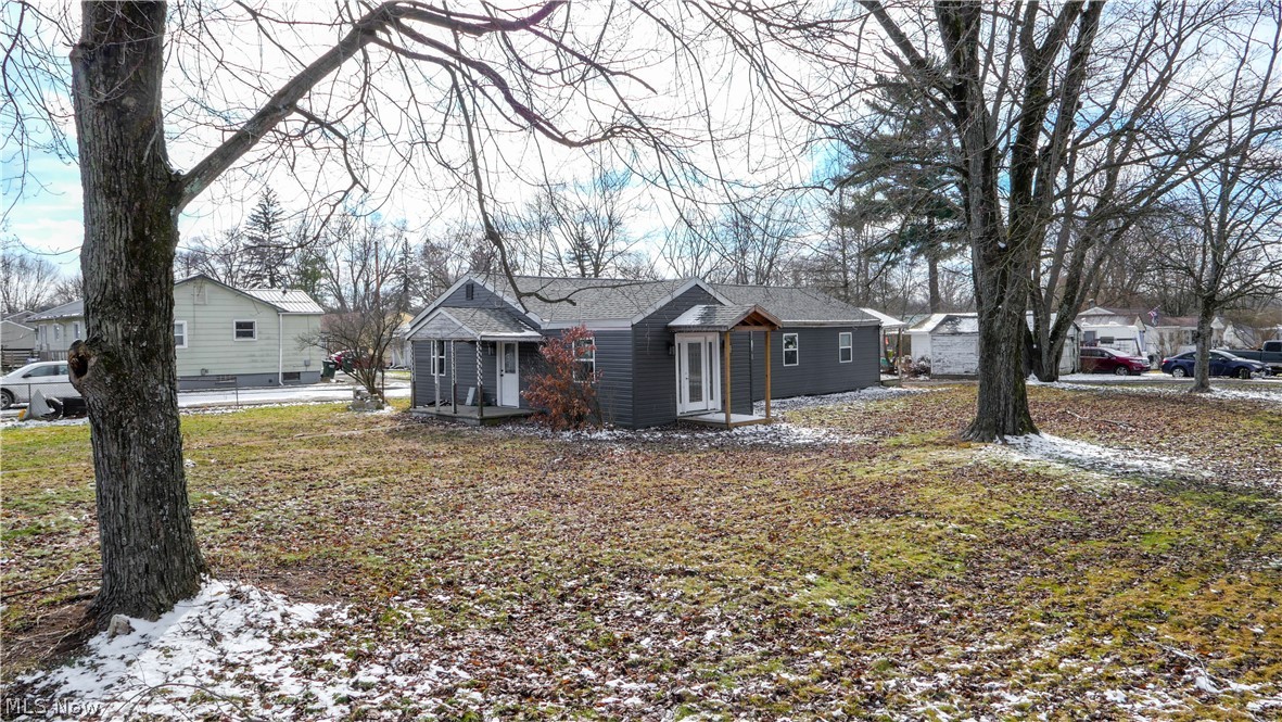 Amazing investment opportunity in Newton Falls with this fully remodeled duplex offering instant equity and long-term rental potential. One side is beautifully finished and move-in ready, featuring a brand-new kitchen with stainless steel appliances, updated bathroom, recessed lighting, new flooring, new furnace and A/C, and fresh drywall and paint throughout. This home was taken completely down to the studs and rebuilt with new electrical, new water hookup, new insulation, new floor joists, new roof, and new siding, giving peace of mind for years to come. The second side is partially completed and ready to be put back together—several materials are included, including drywall and bathroom components—and features vaulted ceilings that offer great design potential. Whether you're looking to build a rental portfolio, live in one side and rent the other, or complete the second unit for added value, this duplex is a rare find with modern updates and strong upside in today's market.