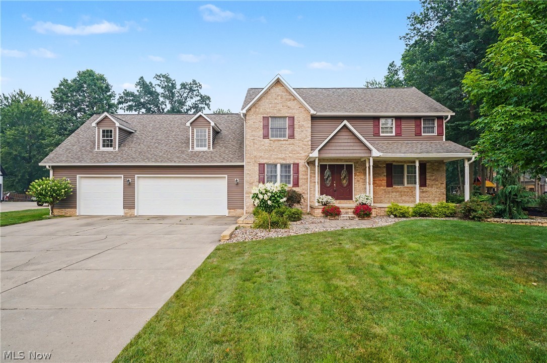 Exceptional 3-4 Bedroom Home with a 4-Car Garage in Desirable Columbiana! This beautifully maintained home offers an abundance of living space, thoughtful design, and exceptional storage throughout.

The welcoming first floor features a spacious front living room highlighted by a cozy gas fireplace. The impressive eat-in kitchen is a chef's dream, complete with cherry cabinetry, a large center island, stainless steel appliances, double ovens, a pantry, abundant cabinet and countertop space, and a bright breakfast area. A formal dining room, convenient half bath, and generous closet space complete the main level.

Upstairs, the spacious owner's suite provides the perfect retreat, featuring a private bath with a relaxing Jacuzzi tub, floor-to-ceiling tiled shower, and a walk-in closet. Two additional bedrooms, a second full bath, and an expansive bonus room offer incredible flexibility for a fourth bedroom, home office, media room, or playroom.

The lower level includes the laundry area and provides a blank canvas awaiting your finishing touches to create the perfect recreation room, home gym, or additional living space. Rounding out this exceptional property is an attached 4-car garage, offering plenty of room for vehicles, hobbies, and storage. Don't miss this fantastic opportunity to make this beautiful Columbiana home your own!
