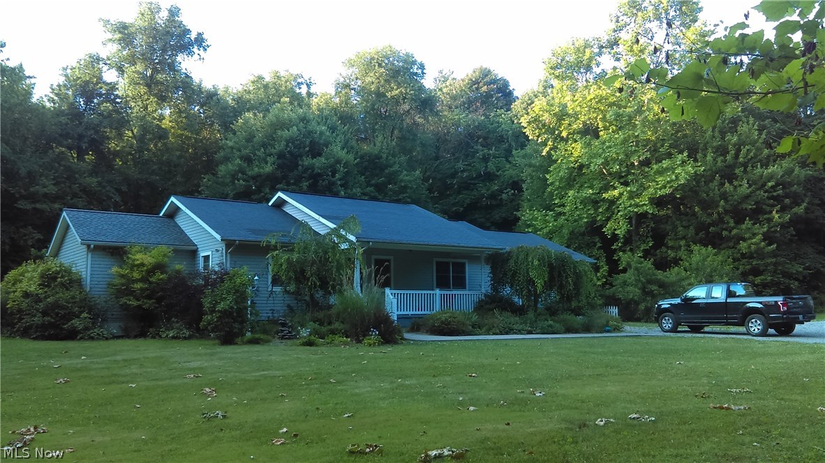 AWESOME RANCH!!! Nothing to do but move in! Inviting 20x7 Front Porch. New carpet and laminate just installed in Living Room, Family Room and Kitchen. The Covered Back Deck is great for Entertaining with Two Ceiling Fans for Comfort and a size of 36x18 Feet. There is a Propane Fireplace plus a Wood Stove for those Cold Winter Nights. The Property is a secluded 10+ acres of wildlife for a hunters paradise or the person who is a wildlife enthusiast!!  A MUST SEE... SET YOUR PRIVATE SHOWING TODAY!!!