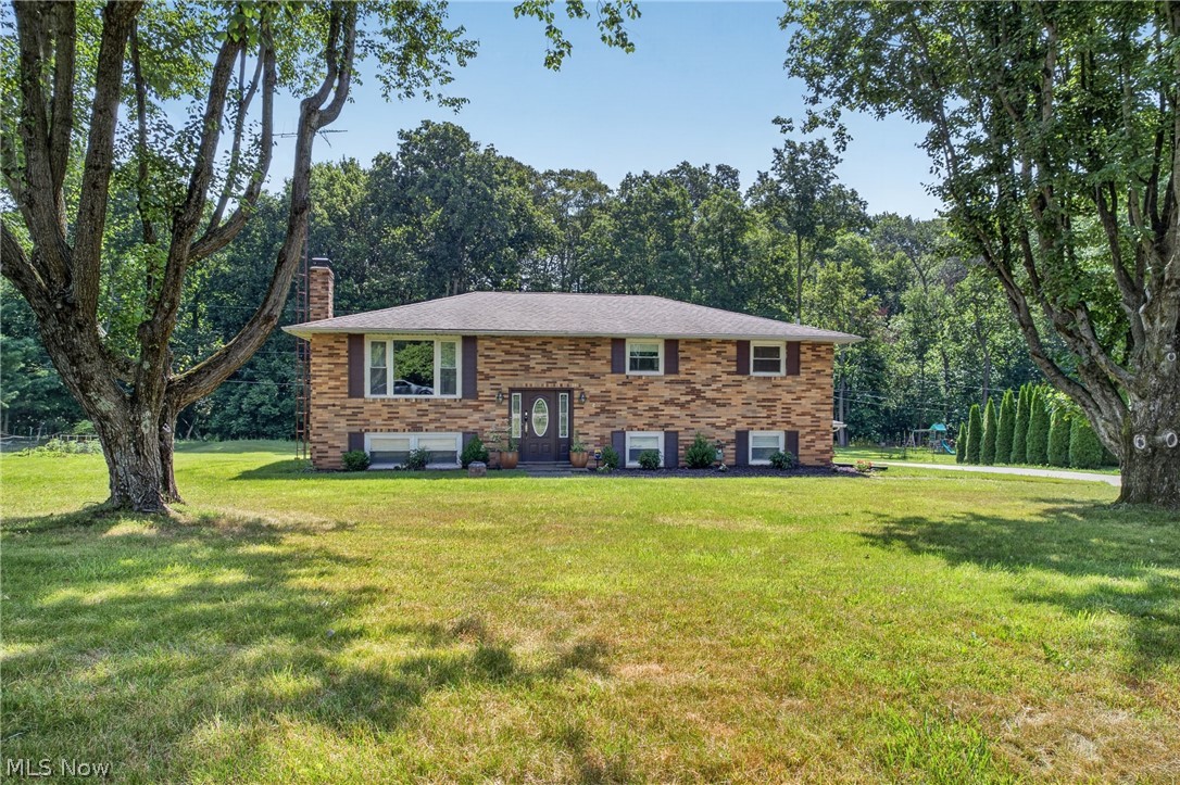 Welcome home to this spacious bi-level nestled on two lots in a highly desirable North Canton neighborhood, located within the sought after North Canton City School District. This well maintained home features three generously sized bedrooms, including a primary suite with its own private full bathroom. The finished lower level recreation room offers the perfect space for relaxing, entertaining, or a home office, while the bright sunroom provides a peaceful spot to enjoy views of the expansive backyard. A two car attached garage plus shed adds convenience and ample storage. With its generous living space, oversized lot, and prime location close to schools, parks, shopping, and dining, this home is a wonderful opportunity to enjoy comfortable living in North Canton.