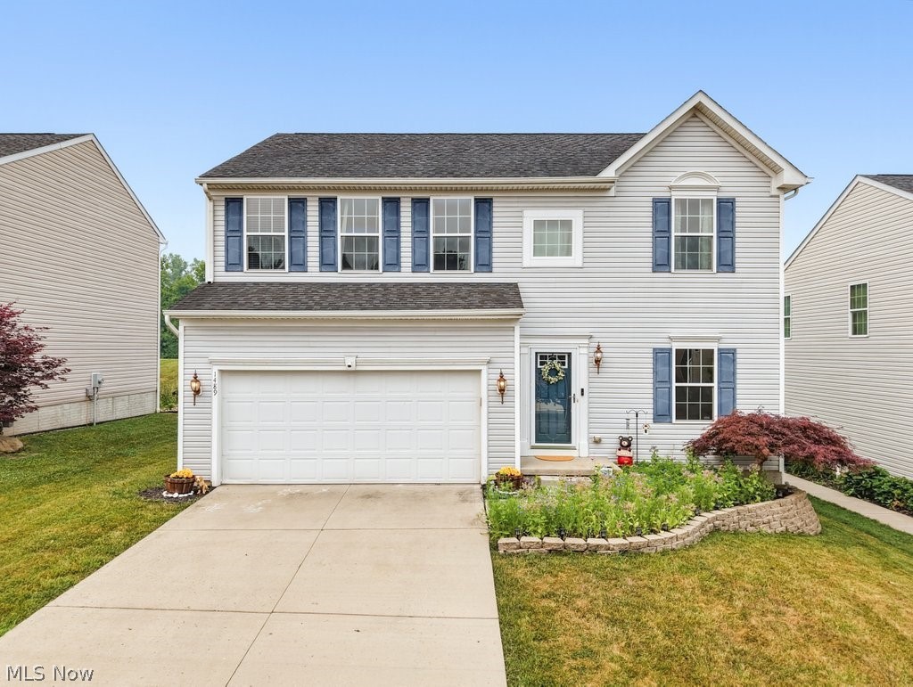 Move right into this beautifully maintained 4-bedroom, 2 full and 2 half-bath home in Streetsboro's desirable Meadow View community! Designed with today's lifestyle in mind, the first floor open plan offers a sitting area, half bath, spacious family room  and a beautifully appointed kitchen featuring stainless steel appliances, a center island with a built-in wine refrigerator, a separate dining area, pantry, and direct access to the 2 car garage. Upstairs, the owner's suite includes a walk-in closet and private ensuite bath, and it also includes a full bath, 3 additional bedrooms and a convenient second-floor laundry room makes everyday living a breeze. The finished basement provides the perfect flex space for a recreation room, home gym, office, or additional entertaining area, along with extra storage and a convenient half bath! Recent updates include a new HVAC system (2022), tankless water heater (2023), microwave, fresh neutral paint, custom laundry shelving, and updated Luxury Vinyl Plank flooring and carpet. Step outside to the spacious deck overlooking a peaceful wooded backyard, offering both privacy and a beautiful setting to relax. Conveniently located near major highways, Kent State University, shopping, restaurants, and everyday amenities, Meadow View also features sidewalks throughout the neighborhood, perfect for walking, running, or biking. This move-in ready home is one you won't want to miss!
