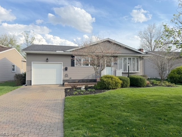 Tucked away on a quiet dead-end street, this nicely updated ranch is designed for easy, single-level living. It features 3 bedrooms, 1.5 baths, a 1-car attached garage and a full basement. Inside is a thoughtfully updated interior with a warm and welcoming feel. The living room has a bay window. The newly remodeled eat-in kitchen includes all of the appliances. The laundry is currently located in the third bedroom on the main floor, providing easy access and flexibility for future use. The sunroom provides a bright and relaxing space to enjoy views of the fenced-in backyard that is perfect for entertaining, pets, or simply unwinding. A 1-car attached garage adds everyday convenience. The beautifully landscaped 60x125 lot is level and easy to maintain. If you are looking for a move-in-ready home in a peaceful quiet setting, this home will be perfect!