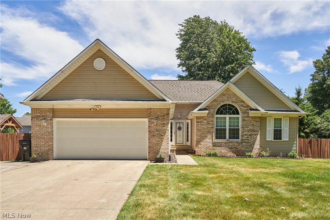 Beautiful Custom Ranch Offering Exceptional One-Floor Living! This spacious 3-bedroom home features a luxurious owner’s suite complete with a private sitting room, glamour bath, Jacuzzi tub, double sinks, and separate shower. The inviting great room boasts soaring vaulted ceilings, a fireplace, and abundant natural light through impressive arched windows. The open floor plan flows seamlessly into the eat-in kitchen featuring oak cabinetry, pantry, ample counter space, and access to the covered patio and backyard. Quality craftsmanship is evident throughout with extensive oak trim, wood flooring, vaulted ceilings, and generous room sizes. The finished lower level provides outstanding additional living space with a large recreation/game room, full bath, bonus room, kitchenette, laundry area, and abundant storage perfect for entertaining, hobbies, guests, or multi-generational living.Outdoor amenities include a covered patio, expansive deck, brick paver patio, storage shed, mature landscaping, and a spacious backyard ideal for relaxation and entertaining. Attached two-car garage and concrete driveway complete this exceptional property. A truly beautiful home offering comfort, functionality, and pride of ownership throughout! Home has an AMERICA'S PREFERRED HOME WARRANTY!  This home is truly ready for you, schedule your showing today!