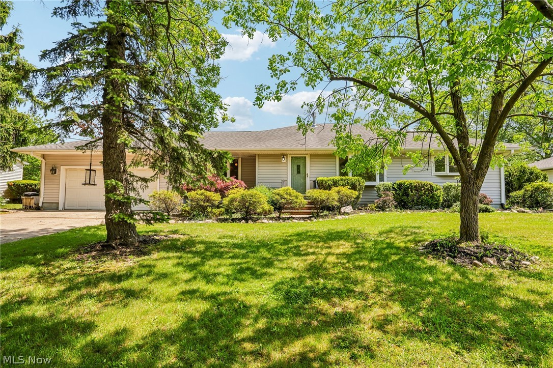 Welcome home to this one owner 3 Bedroom / 2 Full Bath Ranch home situated on .4 beautifully landscaped acres.  As you walk in you are greeted by a semi-open floor plan with a large Kitchen with island overlooking the Dinette and Family Room.  The Kitchen features plenty of storage with oak wood cabinets and adjacent large pantry, countertop cooktop, stove, and newer dishwasher.  The Family Room is very spacious (22’x20’) and has tons of natural light with views of the beautifully landscaped backyard.  The formal Living Room and Dinette have a beautiful bay windows overlooking the front yard.  The Owner’s Suite features a spacious walk-in closet.  Just off the main hallway you’ll find an extra-large full bathroom with walk-in shower, bathtub/shower, linen closet, and extra storage area with cabinets and counter.  Two additional first floor bedrooms – one with double closets and the other with built-in bookcases.  Convenient first floor laundry makes it easy without steps or far to carry clothing.  The semi-finished basement has two additional bonus rooms and an additional full bath with walk-in shower.  Extra downstairs laundry area with utility tub.  Large unfinished utility room with walls of shelves.  The basement also features an extra-large rec room (49’x16’) offering plenty of room for gaming, entertainment, and play areas.  Outside you’ll enjoy grilling on the outdoor patio with tons of green space.  More storage available in the large storage shed.  Two car attached garage. New H2O tank (2024), 1 of 2 Furnaces (2024), and other mechanicals are in excellent condition. Extra wide front driveway to accommodate lots of cars or visitors. This home is located on a quiet street with minimal traffic and is conveniently located near schools, shopping, and is the perfect place to call home!