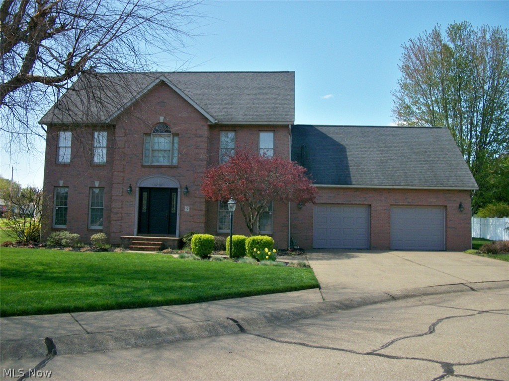 IF BOULEVARD SANDS IN BELPRE OHIO IS ON YOUR RADER, LOOK NO FURTHER! Absolutely beautiful 2,358 sq. ft. 2-story brick home nestled on a quiet cul-de-sac just a short distance from all necessary amenities. A spacious foyer greets you at the front door with a beautiful oak staircase leading upstairs. Flanked to the right is a formal sitting room with low Pella windows with sun shutter shades. To the left is a perfect peaceful spot for all gatherings, the dining room. If entertaining revolves around the kitchen, this convenient layout makes cooking a breeze while chatting & enjoying family hanging around the breakfast bar with an eat-in kitchen. The kitchen with a creamy wraparound cabinetry offers ample space for meal preparation with a fully equipped stainless steel modern appliance package. A first floor laundry room with washer/dryer included. WOW, an extra layer of convenience is an oak staircase to the upstairs bedrooms from the laundry room. Nice-size bedrooms with large shelving systems in the closets & a shared bathroom. Primary bedroom has two generous size walk-in closets & a bonus room that would make a great home office. Primary ensuite bathroom with double vanities with walk-in shower & tub. Above the attached garage is a 14 X 22 recreational room (or Whatever) with oak flooring and a storage closet. Downstairs is a wonderful sun-filled family room with a brick fireplace & a wood mantle. Glass slider doors lead to an expansive deck & paver patio, with that "park-like feel" with the surrounding trees in the well-manicured back yard. Built with quality & care. Awesome location. True gem in the neighborhood. Great place to call home. Let's make it yours.