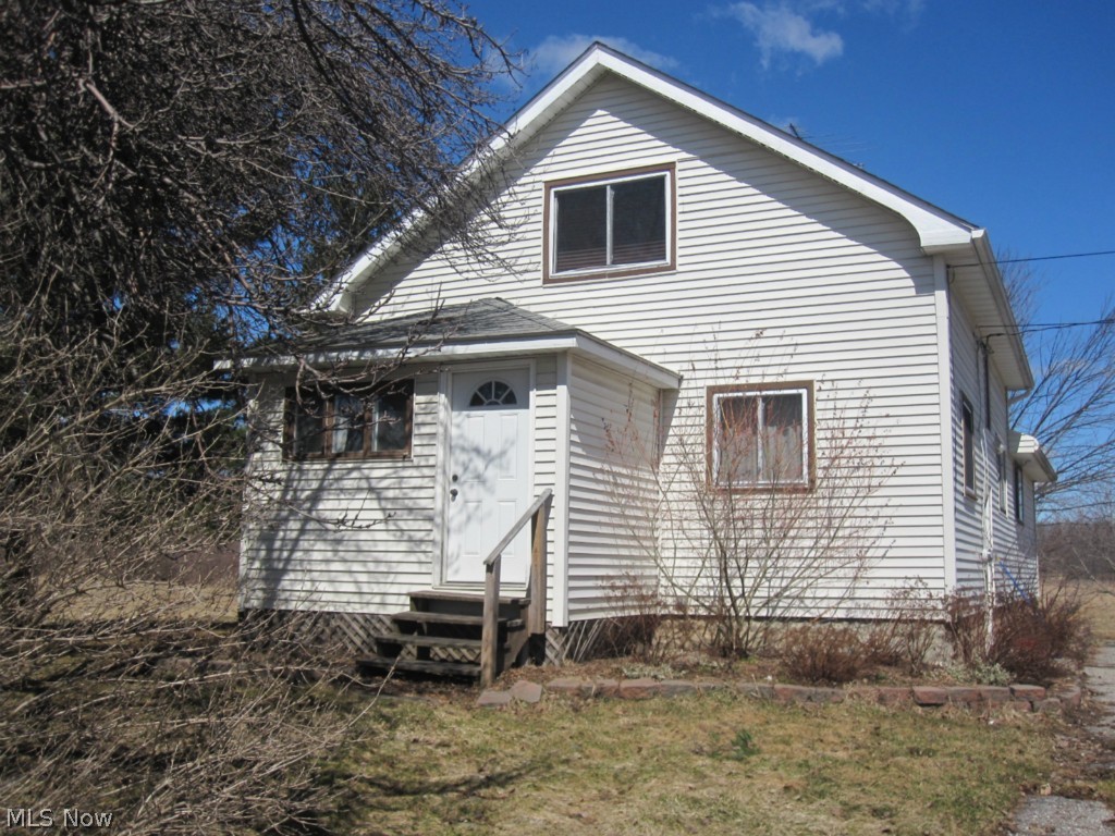 Great opportunity to own a 3 bedroom 1.5 bath home in the country! So much room to grow. Downstairs has hardwood floors throughout. Plenty of room in the oversized kitchen that flows right into the dining room. Master bedroom is on first floor with a half bath and walk in closet. Upstairs has wood floors and plenty of closet space in bedrooms. Wood burner in basement is used to supplement heat or can be used to heat whole home. Updates include chimney,basement windows, hardwood floors and Romex wiring in older part of home. Outside offers plenty of space for livestock, barn and pasture. Playset will stay! All this on 5 beautiful acres! Schedule your showing today!