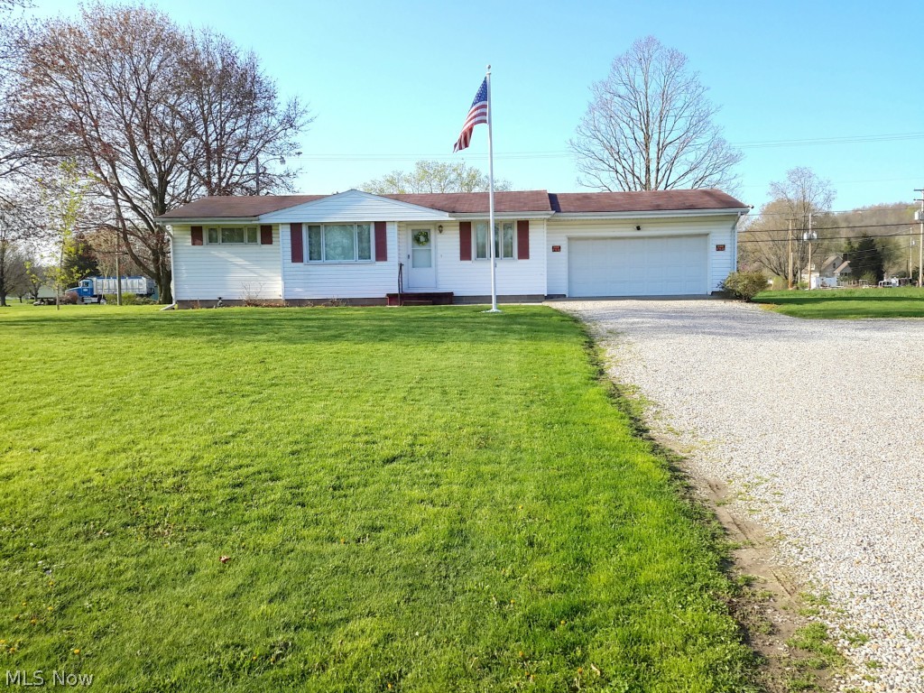 This cozy 3 bedroom 1 bath home sits on 2.6 level acres just outside of West Lafayette. It has a 2 car attached garage plus a 24x32 garage with electric and water, and a covered patio. The bathroom is handicapped accessible, updated items include furnace, water heater and the water softner stays. The 3rd bedroom has a washer dryer hook-up that can be converted to a main floor laundry.