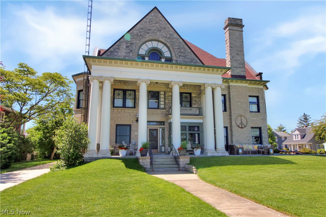Welcome to this stately lakefront stone manor, originally built in 1890, rich in timeless character and architectural distinction. Offering over 6,000 square feet of beautifully preserved living space, this extraordinary estate seamlessly blends historic craftsmanship with modern comfort.

Framed by towering columns and commanding curb appeal, the home features seven spacious bedrooms, four full bathrooms, one half bath, and an abundance of elegant gathering spaces, including a formal living room, formal dining room, music room, private library, and grand foyer.

Original woodwork, pocket doors, crown molding, hardwood floors, and two fireplaces showcase the home's enduring craftsmanship and classic sophistication.

Set on a spacious lot with sweeping views of Lake Erie, the manor invites you to enjoy peaceful mornings and unforgettable evenings from the expansive front porch and north-facing rooms.

Watch sailboats drift by, eagles soar overhead, and seasonal fireworks illuminate the horizon on the Fourth of July and New Year's Eve.

The property also includes a detached four-car garage with a charming summer room, while the private backyard creates a secluded retreat that feels worlds away from city living.

A rare opportunity to own a truly historic residence where grandeur, comfort, and breathtaking waterfront scenery come together.


**Owners are Licensed Realtors in the State of Ohio and are related to the Listing Agent