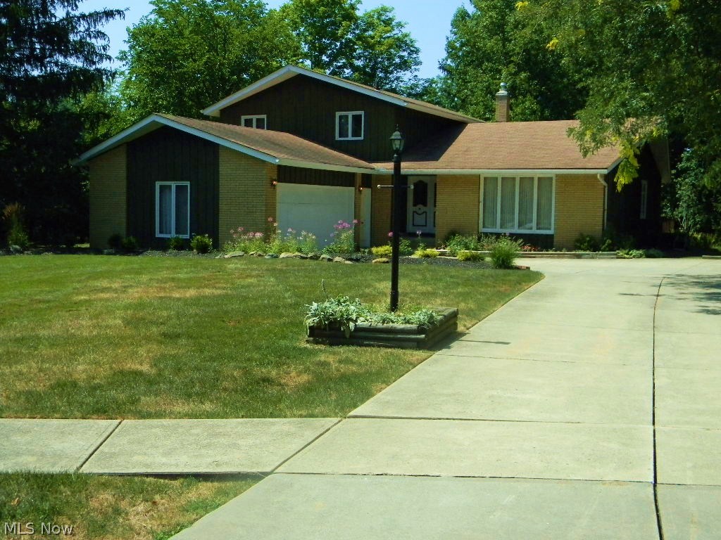 Lovely, spacious home located on a cul-de-sac with a magnificent wooded lot.  4 Br, 2.5 Ba, Split level which offers a large living room, dining room, and kitchen.  Off the kitchen is an extra large family room, fireplace, and a slider to a covered patio and also, a slider to a 27 x 17 deck.  Lower flr Br and Laundry/utility rm.  All bedrooms are a good size.  The driveway offers room to back up.  All appliances stay which are new.  Perfect home for a young family who want to enjoy the spacious yard.