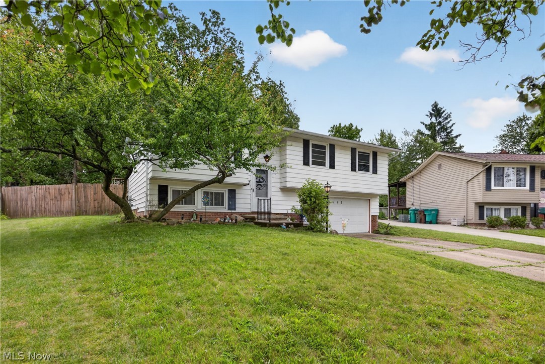 Warm and cozy Bi-Level family home with a large back yard! Home features: 3 bedrooms and 2 baths, living room, dining room and open kitchen which leads to huge partially covered deck with spacious fenced yard. 1  full bath on the main level and a full bath in the lower level along with a family room. There is a large 2 car attached garage.  Hot Water Heater 2024, New carpet throughout 2022, AC and HVAC Maintenance 2026, Windows 2016, Ceiling Fans, 2023, Gutters 2019, dishwasher 2024, refrigerator 2025, Roof 2010.
Nice area close to schools and shopping.