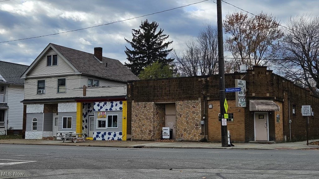 Outstanding mixed-use investment package on high-visibility Broadview Road! This versatile property features three retail spaces—an operating bar (business included), complete with liquor license, equipment, and inventory, plus an ice cream shop and a beverage store—offering multiple income streams and strong commercial stability. Additional residential components include a well-kept 2-bedroom apartment and a detached single-family home, ideal for added rental income or an owner-occupant setup.
Located in a busy commercial corridor with excellent exposure and steady traffic, this property delivers exceptional flexibility and long-term cash-flow potential. A rare opportunity to acquire both income-producing real estate and a fully equipped, licensed bar business in one package. Don’t miss this high-performing, multi-unit asset with tremendous upside!