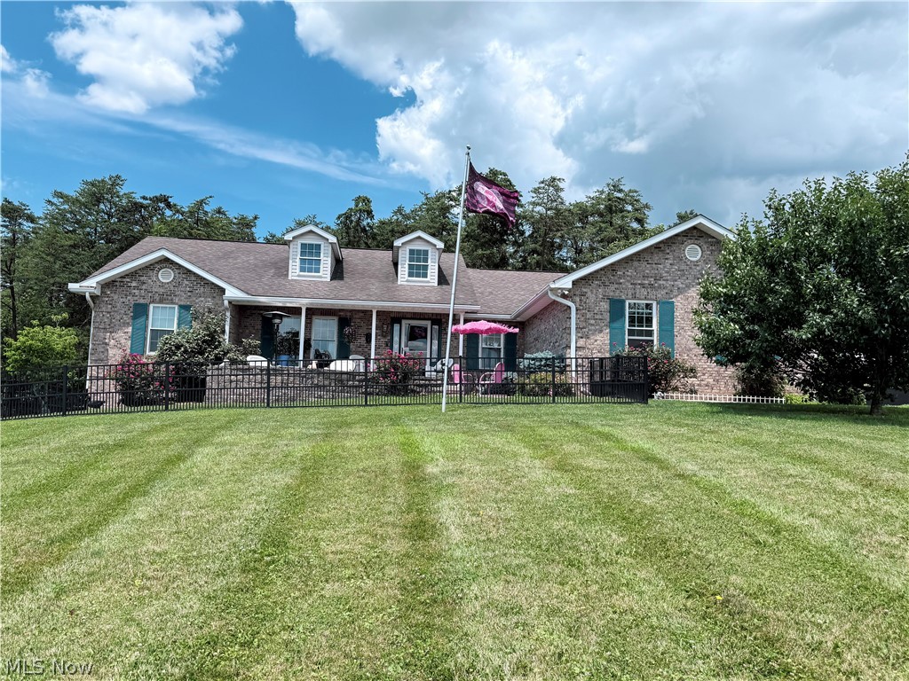 Ever dreamed of trading traffic jams for chickens and fresh air? Here's your chance to embrace authentic country living on a genuine hobby farm where space, self-sufficiency, and rural charm come together beautifully.

This solidly built three-bedroom, three-bathroom home offers approximately 2,800 square feet of comfortable living, anchored by quality construction that promises years of worry-free enjoyment. The massive unfinished basement expands your options to considerably upgrade your visions whether you envision a workshop, recreation space, or extra room for hobbies and storage. Every corner reflects thoughtful craftsmanship and durability.

Outside, the property truly flexes its muscles. Sprawling acreage gives you room to garden, raise animals, or simply enjoy the open skies. Multiple outbuildings and a generous pole barn provide endless utility for equipment, livestock, projects, or that someday-passion you've been postponing. Four cisterns keep water needs covered, while the coveted free gas perk means heating costs that will make your city friends genuinely jealous.

Parking has never been simpler here, with abundant space for vehicles, trailers, and farm gear alike. The peaceful environment delivers the kind of quiet that lets you actually hear birdsong, breathe deeply, and unwind after long days.
Best of all, this rare combination of land, structures, and modern comfort arrives at a price point that represents genuine value for aspiring homesteaders and country enthusiasts alike.

Opportunities like this don't graze around long. Schedule your private showing today and start writing your own rural adventure.
Seller will RETAIN mineral rights.