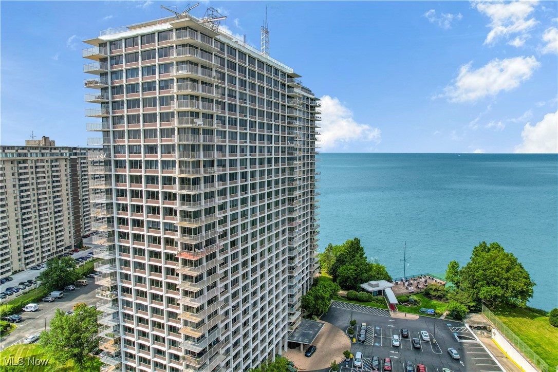 Want to enjoy cooking in your new chef's kitchen featuring stainless steel appliances, granite counters as you look out at the beautiful views overlooking the lake? If so, take a look at this best valued, spacious unit on the Gold Coast with views you will love in every season. Features 2 bedrooms that can easily be converted to 3, 2 full baths, and an expansive 20X36 entertaining area with new plank floors viewing the lake with a wrap around deck for your guests to enjoy! This unit truly has the best 2 parking spaces in the entire complex which features a 24hr manned desk, pool, new workout area, pickleball court, laundry facilities, and the renowned Pier W restaurant offering fine dining. Amenities also include heat, water and internet covered in your maintenance fee. Truly luxury living at its best!!