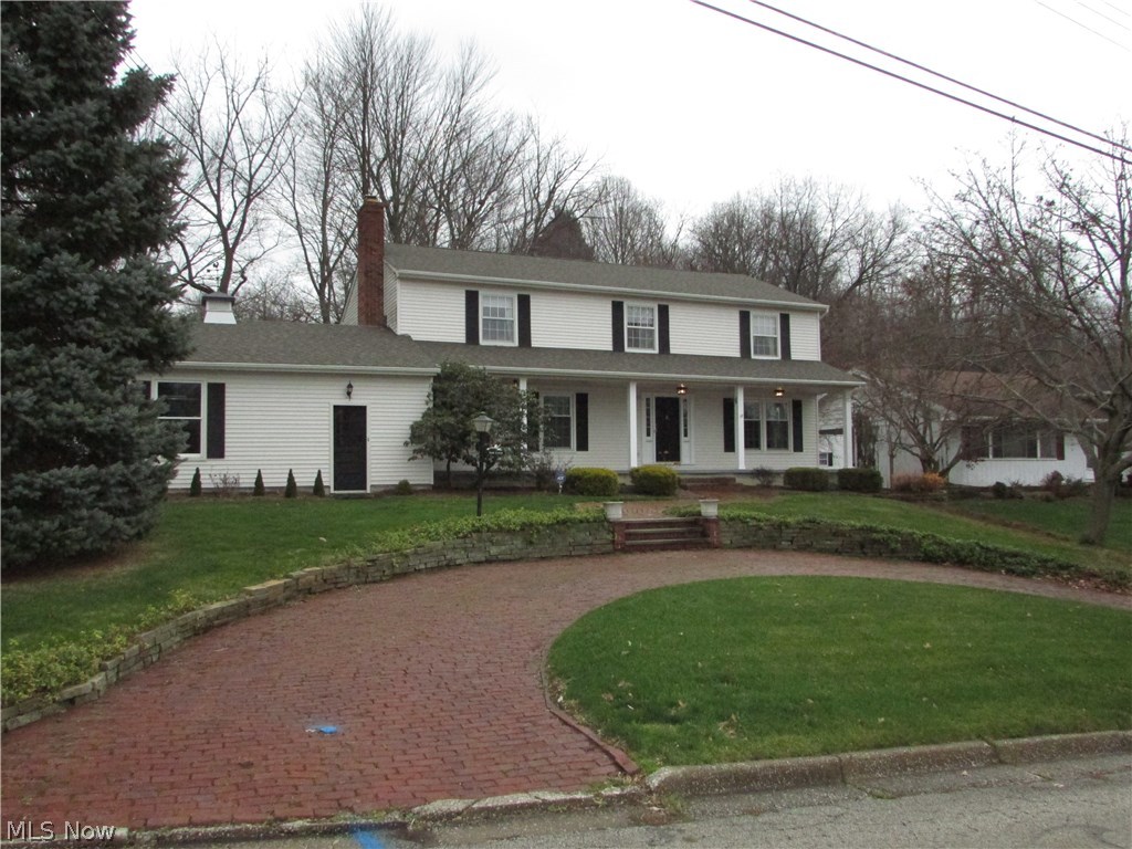 A rare opportunity to buy in Marian Lake, with a view of the water.   This large colonial has 5 bedrooms, with 3 full and 1 half baths.  An open living room is 26x13.  The family room features a fireplace.  An eat in kitchen has Schrock cabinets, corian countertops, all the appliances included, and a desk area.  There is a formal dining room.  The master suite is updated with granite counter top.  Each bedroom is rather large.  The guest bath has double sinks.  A newer roof, furnace, a/c, and windows are just a few of the updates.  The many amenities include: full 12 course basement, 2 car attached garage, deck, front porch, laundry room, and more.