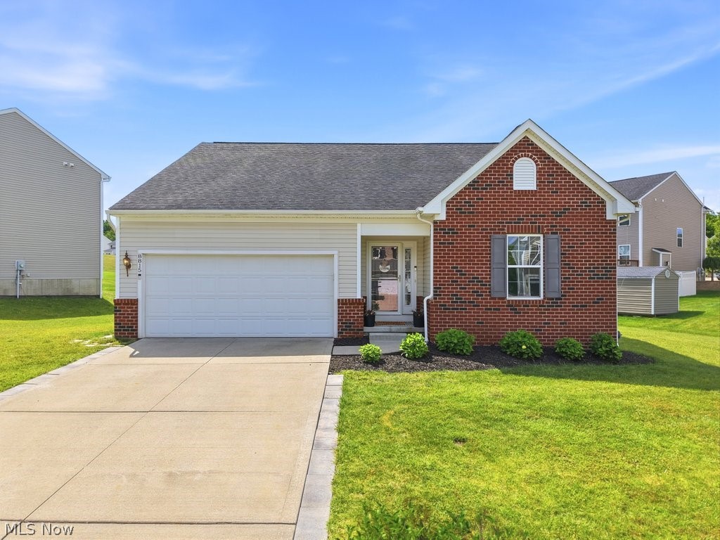 Welcome home to this beautifully maintained ranch in the desirable Meadow View community of Streetsboro, conveniently situated between Kent and Streetsboro with easy access to shopping, restaurants, Route 14, I-480, and the Ohio Turnpike. Offering the ease of one-floor living and an open layout designed for today's lifestyle, this home is ready for its next owner.

The thoughtfully designed floor plan provides privacy and functionality, with two bedrooms and an updated full bath located at the front of the home, while the spacious owner's suite is tucked away on the opposite side of the great room. This private retreat features a large bedroom, an updated ensuite bath with a soaking tub and separate shower, and plenty of space to unwind.

At the heart of the home, the vaulted great room offers a warm and inviting gathering space with a gas fireplace and seamless flow into the kitchen and dining area. The kitchen provides abundant cabinet and counter space, along with a charming coffee bar that adds both convenience and character. The dining area opens directly to the cement patio, creating an ideal setting for outdoor dining, entertaining, or simply enjoying the backyard.
Additional conveniences include a first-floor laundry room and an attached two-car garage with direct access into the home. The finished lower level expands the living space with a large recreation room that can easily serve as a family room, playroom, home office, fitness area, or theater room. The unfinished portion of the basement is already stubbed for plumbing, providing an opportunity to add a third full bathroom in the future.

Recent improvements include a replacement sump pump and the installation of a radon mitigation system. For added peace of mind, a one-year home warranty is being offered to the buyer. All that's left to do is move in and enjoy everything this fantastic neighborhood has to offer.