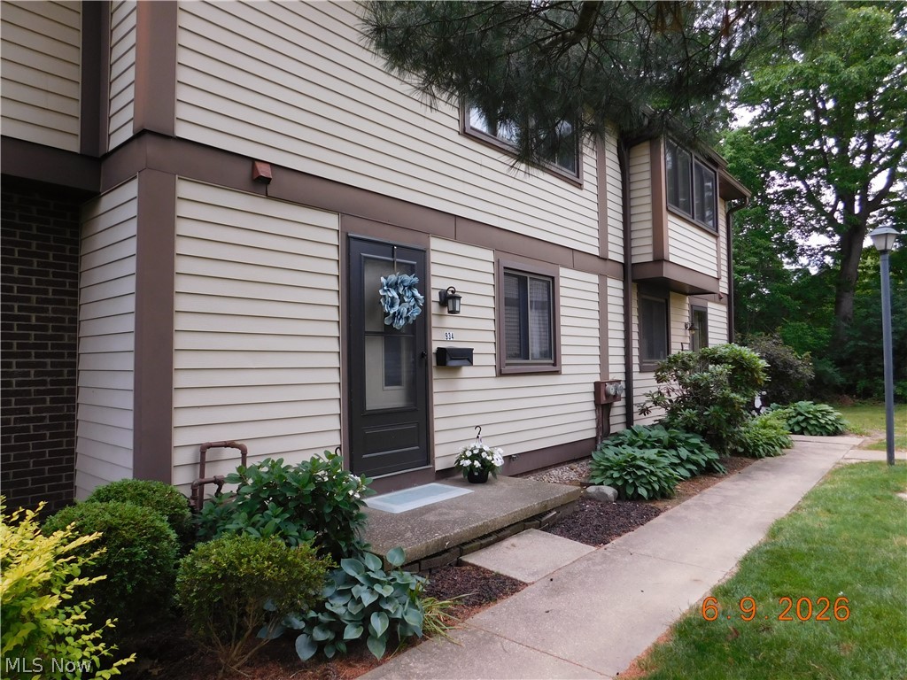 This 3-bedroom, 1.5-bath Townhouse offers spacious, low-maintenance living in a desirable location. The main level features easy-care flooring, filled with natural light a bright white eat-in kitchen with included appliances, a dining area, updated half bath, and a spacious living room with a gas fireplace. Upstairs offers a large owner’s suite, two additional bedrooms, one bedroom used as a home office with wall shelving and an updated full bath. The full basement adds valuable storage and utility space with a shower, washer and dryer, sink, and mechanical updates. Enjoy the private fenced brick patio, plus included one car garage parking and an additional assigned space. Updates include: H20 tank 2023, garbage disposal 2033, 1st floor vinyl flooring 2021, vinyl fence 2021, updated bathrooms. Seller is offering a flooring concession. Most furnishing stay. Hampton Ridge Community amenities include a pool, tennis courts, clubhouse, plus nearby shopping, parks, and easy access to Metro Parks and local attractions. HOA fee includes Spectrum cable and internet.