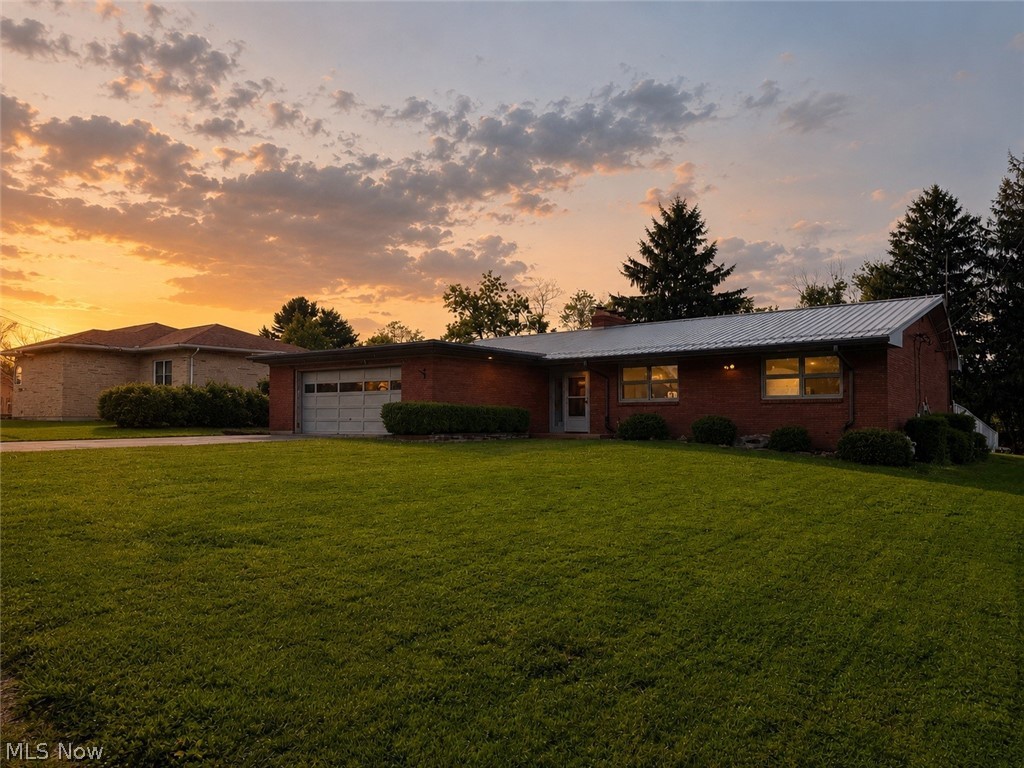 Tucked away in the heart of Steubenville, this one-of-a-kind home channels timeless Frank Lloyd Wright inspiration with clean lines, warm character, and thoughtful design but with all the modern updates you actually want. Fully remodeled from top to bottom, this 3-bedroom, 2-bath beauty blends architectural charm with everyday functionality. Inside, you’ll find durable LifeProof flooring flowing seamlessly throughout, creating a sleek and cohesive feel in every room. The completely reconfigured kitchen has been transformed into the true heart of the home with updated finishes, improved layout, and plenty of style to spark your inner chef. Both bathrooms have also been tastefully remodeled, offering fresh, modern comfort while keeping the home’s unique personality intact. Equal parts quirky, cozy, and contemporary, this is not your average cookie-cutter house; it’s a conversation starter with character around every corner.