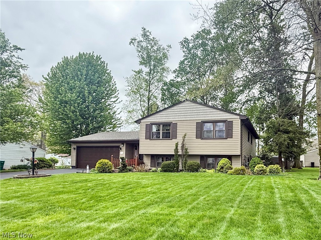 Welcome to this beautifully maintained and updated home - offering space, comfort and flexibility for today’s lifestyle. Featuring four spacious bedrooms plus a private office that could easily serve as a fifth bedroom, this home provides plenty of room to grow.
With two full bathrooms and multiple living areas, there’s space for everyone to relax and unwind. On the upper level, you’ll find an inviting living room, a dining room and a well-equipped kitchen with all appliances included. This level also features the home’s bedrooms and a full bathroom with double sinks, generous counter space and ample storage. The primary bedroom is a true standout offering two oversized, double-deep walk-in closets that provide exceptional storage. The main level offers a welcoming entryway with convenient access to the garage, upper level, and lower level. Just off the entryway, a sliding glass door leads to a covered patio that flows out to a beautiful Nature Stone patio and deck. It's the ideal spot for entertaining or simply relaxing outdoors. Downstairs, enjoy a generous additional living space complete with a cozy gas fireplace—ideal for movie nights, gatherings or a quiet retreat.
The laundry room is a true highlight—spacious and filled with natural light, featuring an oversized utility sink and plenty of room to make everyday tasks more convenient and enjoyable. Situated on a desirable corner lot just over half an acre, the property also includes a shed for extra storage and a whole house generator with 5 year warranty for added peace of mind. All major mechanicals and big-ticket items have been updated, making this home truly move-in ready. For added confidence, the sellers are offering a one-year home warranty.
This home combines comfort, functionality, and charm—ready for you to move in and make it your own.