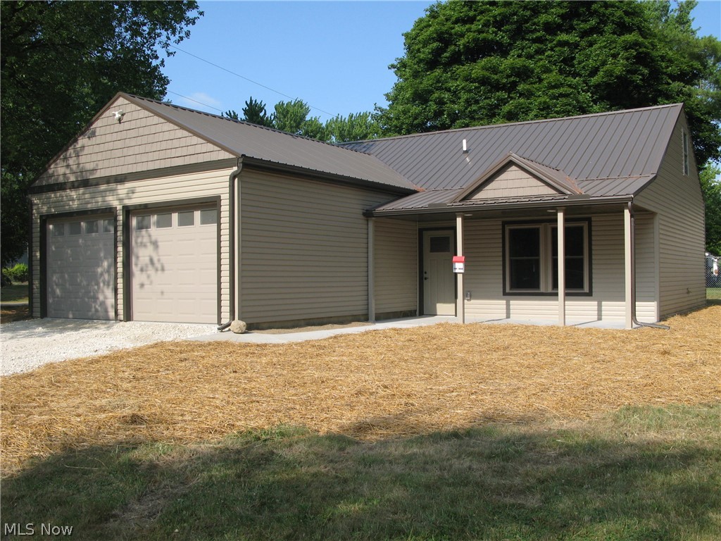 Stunning 3/4 bedroom ranch where virtually EVERYTHING IS NEW!  The completely remodeled kitchen is highlighted by solid wood, easy close cabinets finished in a beautiful gray stain, solid surface countertops, and all new stainless steel appliances.  Other features included TWO FULL remodeled baths, new flooring throughout, new drywall and paint, new LED lighting, new HVAC, new windows, new entry doors, new concrete garage floor, new front porch, new well pump, new METAL ROOF, new siding and more!  The first floor office could be an additional first floor bedroom.  .636 acre lot.  Quick possession.