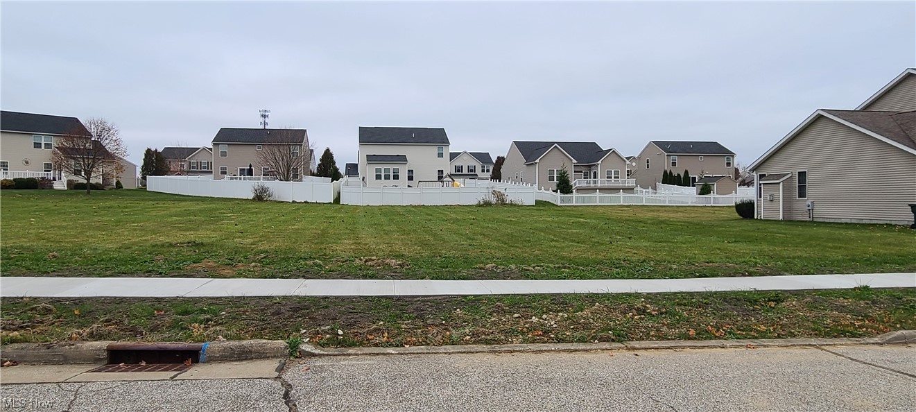 Come build your dream home in this established neighborhood of New Haven, located in a country setting of Barberton, Ohio. This development has public utilities available and tree lined streets with sidewalks present. Enjoy the neighborhood amenities of a playground and much more. Any builder is welcome. Call today!