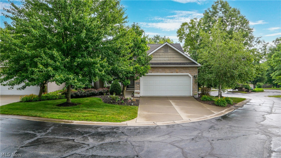 Welcome to this beautifully maintained 2-bedroom, 2-bath condominium in the desirable Waterford Crossing! This move-in ready home offers the ease of low-maintenance living with an open-concept ranch floor plan and over 2,300 square feet of finished living space, including a beautifully finished walkout lower level. The spacious great room features vaulted ceilings, a cozy gas fireplace, and open layout that flows seamlessly into the dining area and well-appointed kitchen with upgraded cabinetry, crown molding, and quality countertops. Just off the family room, the bright morning room/sun room is filled with natural light and opens to a private balcony-perfect for enjoying your morning coffee or relaxing at the end of the day. The main level includes two generously sized bedrooms, two full bathrooms, and a spacious primary suite complete with a walk-in closet and private bath. The finished walkout lower level provides exceptional additional living space, ideal for a home theater, recreation room, home office, fitness area, or entertaining guests. The unfinished portion offers abundant storage and is already stubbed for an additional bathroom, providing excellent future expansion potential. Complete with a two-car attached garage and located just minutes from shopping, dining, parks, and major highways, this exceptional condo combines comfort, convenience, and carefree living. Schedule your private showing today!