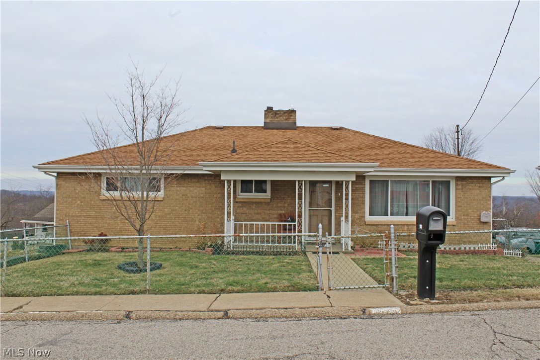 The one you've been waiting for! Lovely brick ranch on Weirton Heights is ready for you to move right in. This 2-3 bedroom home features an updated and renovated bathroom, huge rec room, nice deck with a beautiful view for entertaining, and an Amish built shed for extra storage. Home Warranty included. Call today to schedule your private tour!