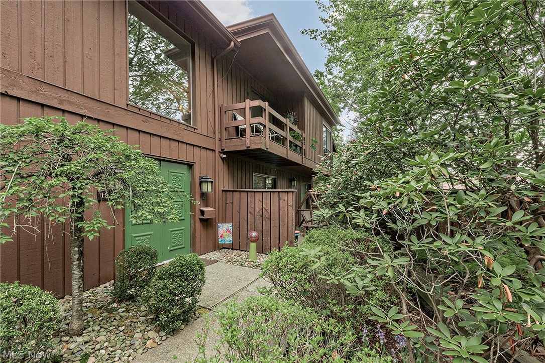 Welcome to this beautifully maintained condo in The Pines at Twin Lakes, where comfort meets privacy in a serene, wooded setting. This spacious home features a stunning vaulted living room anchored by a dramatic floor-to-ceiling brick fireplace that also serves as a unique see-through centerpiece.The kitchen is thoughtfully updated with quality KraftMaid cabinetry, granite countertops, GE profile appliances, and ample workspace—perfect for both everyday living and entertaining. Just off the main living area, enjoy a screened-in sunroom complete with a hot tub, offering a relaxing retreat with peaceful views of the private, tree-lined backyard.
This home offers three bedrooms, including a versatile third bedroom ideal for a home office or guest space. Two of the bedrooms feature generously sized walk-in closets. Additional highlights include a welcoming front porch, a private balcony, and an abundance of mature trees that create exceptional privacy year-round, and a newly paved driveway (2026).

A rare opportunity to enjoy low-maintenance living in a tranquil, nature-filled community.