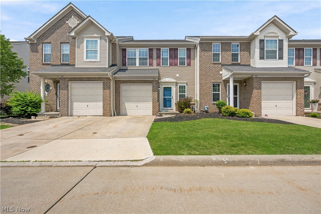 Welcome home to this beautiful townhome in the highly desirable Sandstone Ridge subdivision! From the moment you step inside, you'll love the bright, open floor plan featuring 9-foot ceilings throughout the living room, dining area, and kitchen, creating a spacious and inviting atmosphere.

The kitchen is the heart of the home with beautiful maple cabinetry, black appliances, and a large center island that's perfect for meal prep, entertaining, or gathering with family and friends.

Upstairs, you'll find three bedrooms, including a spacious primary suite featuring two closets and a private en-suite bathroom. The additional two bedrooms offer generous closet space and share a full hallway bathroom. You'll also appreciate the convenience of a second-floor laundry area with room for a full-size washer and dryer.

Need more space? The finished basement adds almost 700 square feet of additional living area, giving you endless possibilities for a family room, home office, workout space, playroom, or media room. There's also plenty of storage to keep everything organized.

Step outside onto the private deck, the perfect place to enjoy your morning coffee, grill dinner, or unwind after a long day.

If you've been looking for low-maintenance living without sacrificing space, this townhome checks all the boxes. Schedule your private showing today!