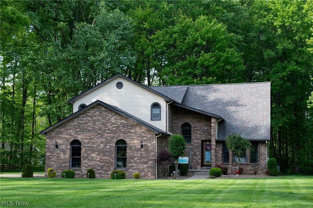 No city tax here. Great wooded lot on a cul de sac with room for large detached outbuilding if desired. Not a builder special. Custom built by the owner. 12 in. block with rods and concrete every 4 feet, double joists, 200 amp electrical, outlets as far as the eyes can see, 8'6" basement height, built in wet bar, built in book case, newer roof, hvac, well pump and h2o tank, whole house security, well is 326 feet deep for superior water quality, lincoln windows, superior insulation, all bath areas insulated for peace and quiet throughout the home and solid cherry wood work and interior doors and cabinetry. Don't wait on this custom home. location is close to all major shopping, but has the feal of a secluded country home with 1.89 acres, woods and cul de sac location.