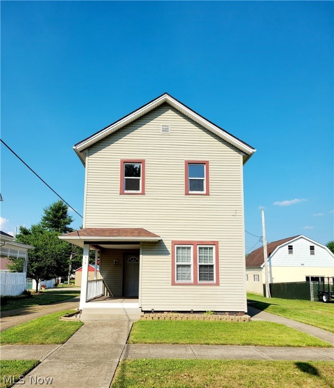 Nicely updated home in the heart of Beach City! Completely move-in ready, 3 bedroom, 2.5 bath home. The kitchen is beautiful! There is 1 bedroom as well as a full bath on the first floor and 2 bedrooms and a full bath upstairs along with a large bonus room on 2nd floor that could easily be used as a 2nd floor family room/playroom or a 4th bedroom if desired. The amount of space in this house is fantastic! Lots of nice updates. All appliances stay. Nice size yard and large parking area that also has electric provided! Call to schedule your Showing Today!!