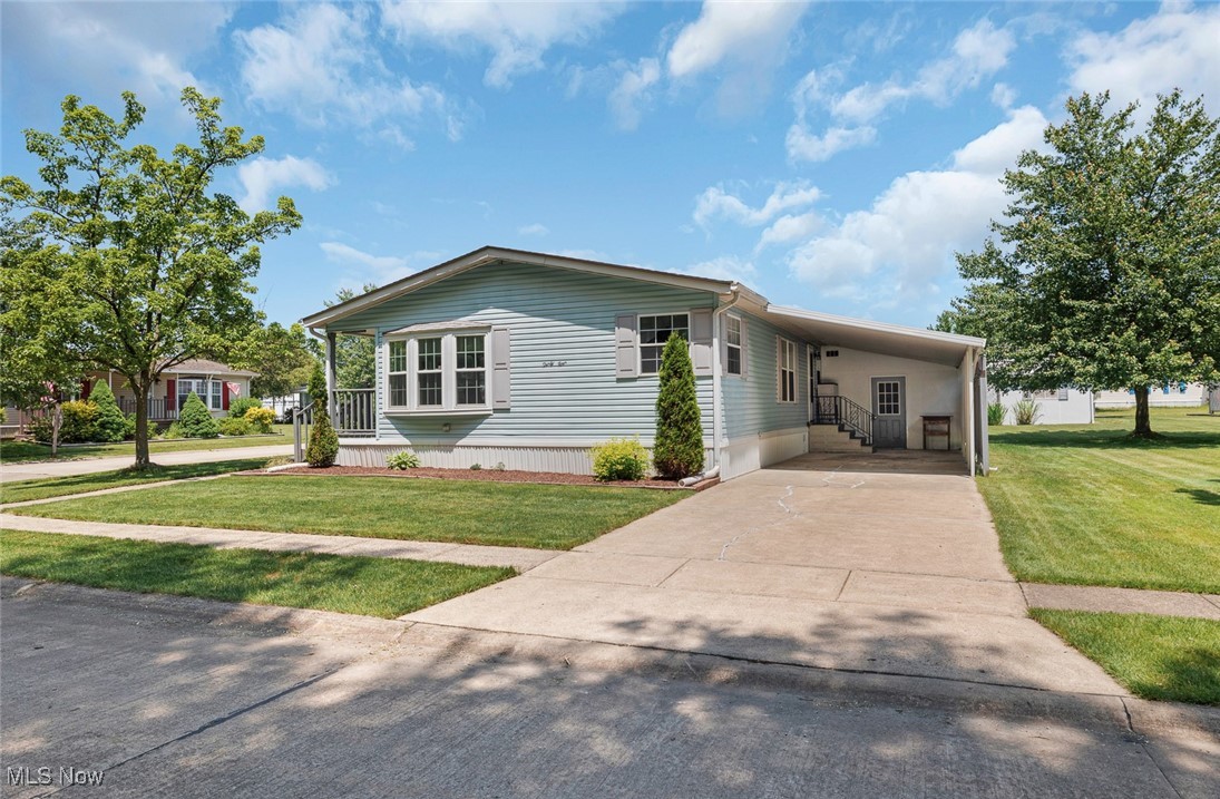 COLUMBIA PARK IS A 55 AND OLDER CONCEPT OF LIVING and is Ohio's Premiere Adult Land Lease Community! Amenities include: Gatehouse managed entrance! On site Shopping Plaza! On site Management! Walking Path/Dog Walking Path! Shuffleboard! Bocce Ball! Library! Crafts, and Social Hall! WELCOME HOME to this 1993 Schult manufactured home offering 1680 sqft. featuring 2 Bedrooms, 2 Full Baths, Formal Living and Dining Rooms.  This home also offers an Eat-In Kitchen with a morning room, a Den and a Laundry Room.  From the Den, there are sliding doors going out to a very nice porch.  There is also a very nice Patio Partner offering awesome storage space. This home has been beautifully maintained and is located on a corner lot on a lovely wooded street. There are some newer windows and nicely painted.  Why not set up your own personal viewing today.......