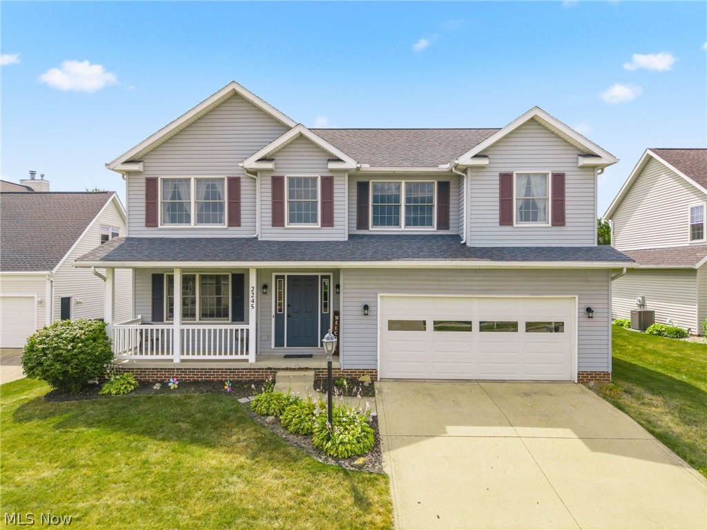 Space to Grow, Room to Gather - Welcome HOME! This spacious 5 bedroom, 2.5 bath home, tucked into a quiet cul-de-sac in the desirable University Village neighborhood of Massillon within the Perry Local School system, has all you could want and more! Offering nearly 2,500 square feet of thoughtfully designed living space, this home combines comfort, functionality, and space for everyone. Tons of windows fill every space with natural light. The open concept layout creates an inviting flow through the main living areas, while the additional living room with french doors could easily be used as a home office or den. The kitchen provides the ultimate in convenience with stainless appliances (all less than 2 years old), a large walk in pantry, and a breakfast bar. Open to the roomy dining area with sliding doors to the large back yard, and the family room beyond, this one is MADE for cooking, baking, entertaining and visiting with guests...seamlessly. A half bath, entry to the garage and the full basement round out the first floor. From the 2 story foyer, head upstairs to 5 spacious bedrooms, including the primary with walk in closet and full bath plus an additional full bath with linen closet off the hallway. Tucked behind a pocket door, you'll love the ultra convenience of the second floor laundry room. The full, unfinished basement, with its high ceilings and plumbing already in place for an additional full bath, offers a prime opportunity to finish it to suit your every wish!

Highlights include: demand hot water system, new LVP flooring through most of the first floor (2026), new carpeting-stairs and second floor (2026), new dishwasher and microwave (2026)

Schedule your private showing today!