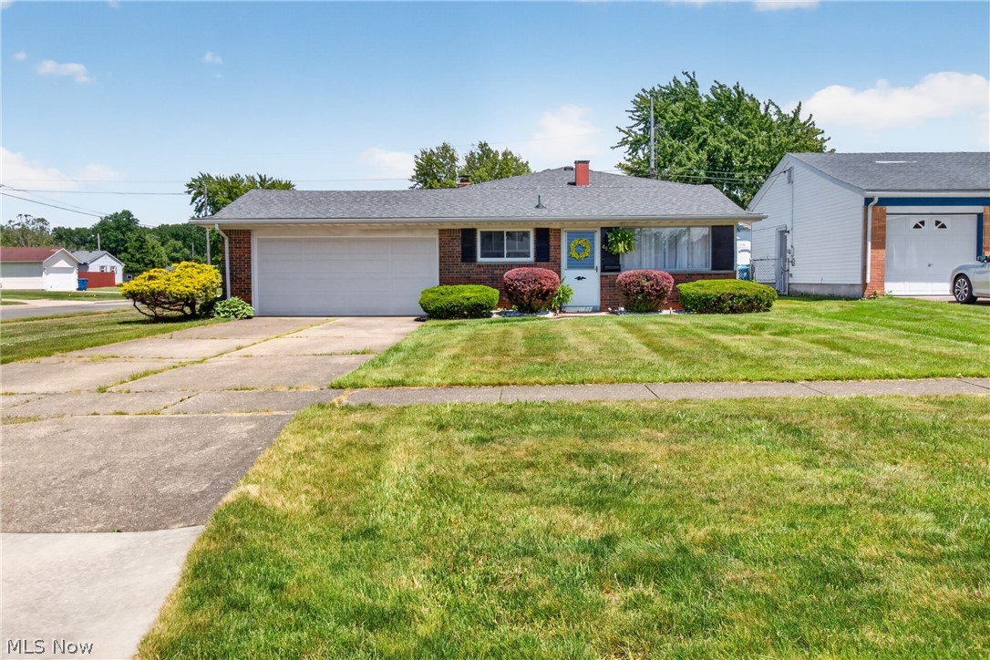 Well-maintained split-level home that's full of character and ready for its next owner! The main level features a welcoming living room and kitchen, creating a comfortable layout for everyday living and entertaining. All appliances stay for the new owner. Kitchen offers lots of counter and cabinet space as well as vinyl plank flooring. 

Upstairs, you'll find three bedrooms and a beautifully remodeled full bathroom. Original hardwood floors lie beneath the carpeting in the bedrooms and hallway, offering the opportunity to uncover even more timeless charm.

The lower level provides a cozy second living space complete with a wood burning fireplace, new luxury vinyl plank flooring, and a full bathroom. Perfect for movie nights, game days, or a relaxing retreat.

Step outside to the patio and inviting backyard, ideal for summer gatherings, morning coffee, or simply enjoying the outdoors. A two-car attached garage adds convenience and extra storage.

This home offers the perfect blend of comfort, charm, and functionality. Don't miss your opportunity to make it yours!