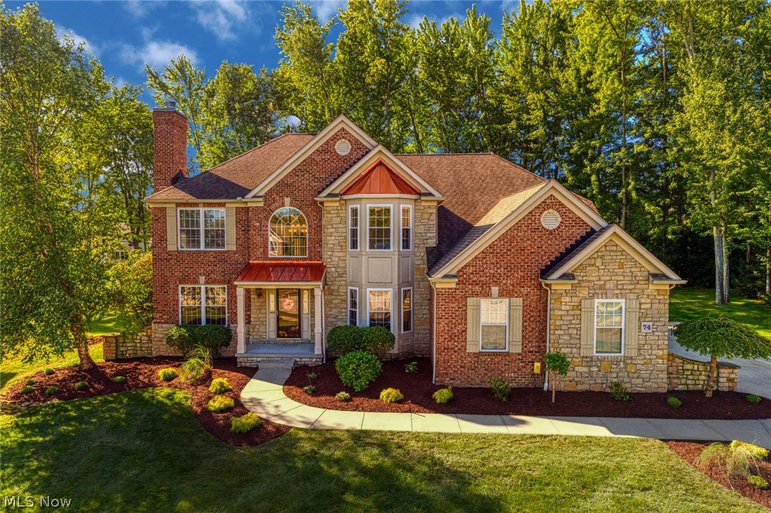 Welcome to this stunning, Millstone model home, nestled in the desirable Stonegate development bordering Hudson. 
As you enter the home, the main floor features a 16x10 dining room, private entertainment room, laundry/mud room, and an office/study room with a fireplace and woodwork accents. Soaring coffered ceilings, windows, and a double sided vaulted fireplace will catch your eye from the moment you walk into the open living room. Flowing into the 20x16 eat in kitchen features granite countertops, 2 eat in bar tops, a fireplace, soft close drawers, and tuscan style tile; It’s sure to be the heart of your home entertainment. 
Upstairs is 4 bedrooms, 3 full baths, and a master suite you won’t want to miss. The basement has poured concrete walls, and is ready for you to finish as you please. Your big ticket items are set: Top of the line furnace, HVAC system, and 73 gallon water heater were all completed in 2020...and did I mention the attached, 3 car garage? 
This home is perfectly