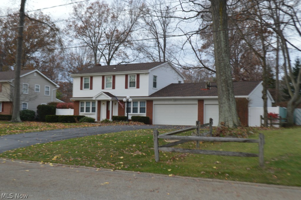 Welcome to one of Canfields best kept secrets, Williamsburg Drive! Beautiful dead-end street with wonderful neighbors!! Come check out this Perfectly Move In Ready... 4 bedroom 2 1/2 bath beautiful colonial with a 3 Car Garage. This home is extremely well maintained and features an in ground swimming pool with a Slide!!! Air conditioning & A whole house Fan....A New roof, New vinyl siding, New Windows, Brand New Dishwasher & All Freshly Painted!! Incredibly Large Front Living Room with Fire Place, Formal Dining room with and eat in kitchen as well as an Island with stools, Awesome back family room with a Beautiful Fireplace. Off the kitchen is a dressing room & bath for your pool guests to the patio where there is a vacation right in your backyard!! Check out the Workmanship and Trim Woodwork in this Home...they just don't make em like this anymore, the Crown Molding is Beautiful!! What a wonderful place to call home. Call Now & get in before the Holidays- Immediate Possession!! This w