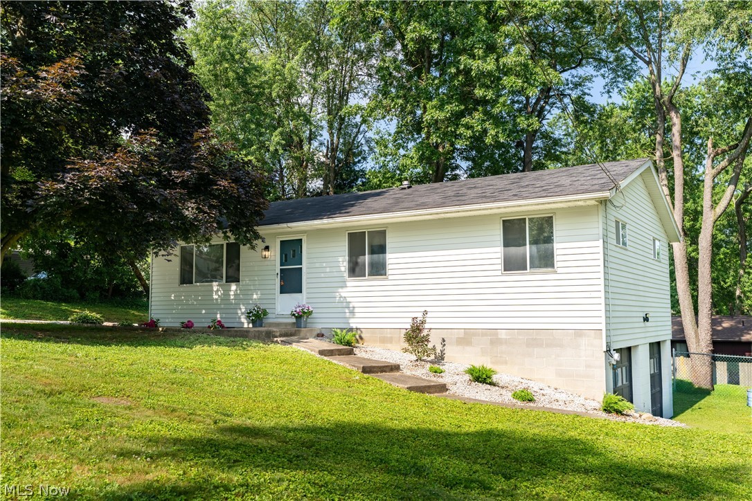 Welcome to this charming 3-bedroom, 1-bath home nestled in the heart of Portage Lakes! This well-maintained property offers comfortable living with a spacious layout and plenty of potential to make it your own. The inviting living area provides the perfect space for relaxing or entertaining, while the functional kitchen offers ample cabinet and counter space. Outside, you'll find an attached 2-car garage providing plenty of room for parking, storage, or a workshop. Conveniently located near Portage Lakes, shopping, dining, parks, and major highways, this home combines comfort, convenience, and an excellent location. Don't miss your opportunity to enjoy all that Portage Lakes living has to offer!