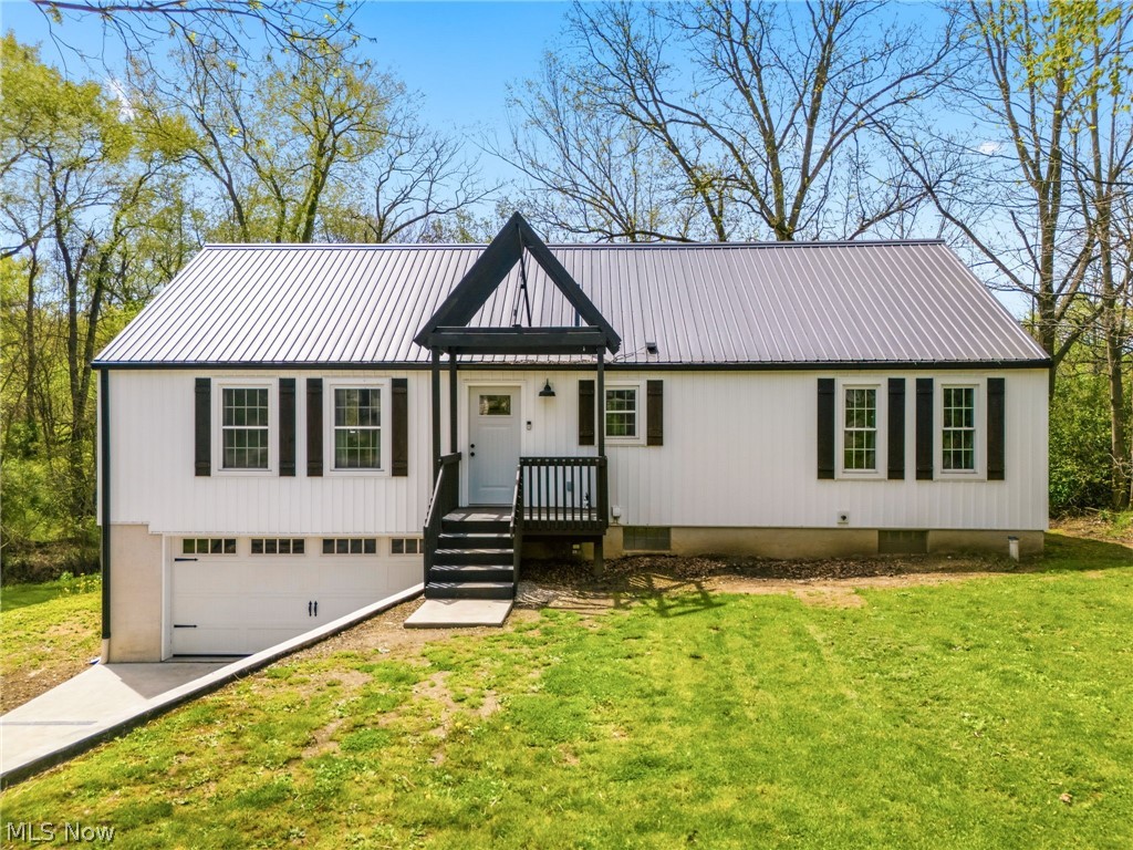 You must see this completely renovated home in 2024 on almost an acre in Tuslaw School District. Pull into your private driveway to your 2-car garage. You also have additional parking off of the road in front of the house. Open concept living with a beautiful kitchen featuring granite counter tops, large island, garbage disposal and built in microwave all with a view of your private back yard. A half bath right off of the living room for guests. Three bedrooms with 2 on the main floor. Wonderful master bedroom with a walk in closet and gorgeous master bathroom featuring a double vanity & tub shower combo. The second bedroom is also located on the main floor. It has 2 entrances; one conveniently located next to the main bathroom on the first floor, the second across from the first-floor laundry. The first-floor laundry is located off of the main hallway. It is a very spacious, deep, walk in area with plenty of room for storage! The enormous 26 x 15 third bedroom is located on the second floor. It could easily be made into 2 bedrooms if needed. So much character with a small opening to the first floor. The opening could be closed off for more privacy. The stairs to the 2nd floor bedroom are conveniently right next to the main bathroom on the first floor. The basement offers plenty of storage or could be finished for more living space. The back of the house is set up for a possible 2 level deck or deck/patio with patio doors off of the dinette. So much potential to enjoy the beautiful, private yard! Plenty of space for kids and pets! Close to Newman's Creek. Call for your private showing today! BOM 5/19/26, Have full summary pages of home inspection, Have well & septic inspection reports – PASSED!  APPRAISED with no repairs. Water filter changed 5/17/26, Furnace filter changed 5/18/26.