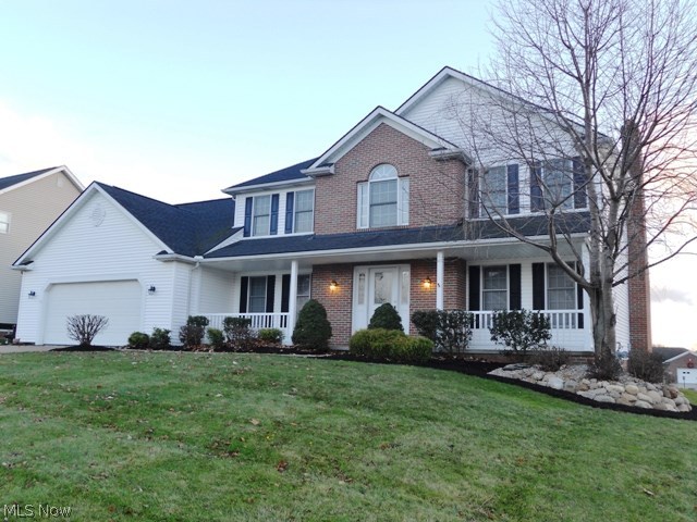 Wonderful & spacious 4 bedroom, 2.5 bath, colonial with many extras!  Foyer entry w/ceramic tile.  Formal living room with French doors.  Beautiful family room w/brick gas fireplace open to large kitchen & dinette area complete w/granite countertops & wood flooring.  Lovely formal dining room also with wood flooring.  Half bath & 1st floor laundry complete the main level.  Master bedroom w/master bath features soaking tub & separate shower.  3 more bedrooms & full bath complete the 2nd level.  Must see fabulous finished lower level offering family/media room, rec room w/bar area & pool table, office area or exercise room plus utility room with storage.  Nice landscaping & outdoor entertaining made easy w/large composite deck & relaxing water feature. 2+ car garage & extra storage & additional parking pad.  Fresh paint & new carpet throughout.