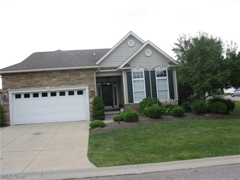 Beautifully appointed 3 bedroom, 3 full bath home situated in the quaint subdivision of Heron Crest. Gracious entrance foyer w/columns leads you into the vaulted great room with fireplace, arched windows, and a walk out to a fabulous stone paved patio with stone walls and park like landscaping. Open kitchen & dining area w/stainless steel appliances & cherry cabinetry. Guest bedroom & full bath on the main floor. Office w/glass French door & hardwood flooring & crown molding. Large master on first floor w/a glamour bath, large walk in closet. Full bedroom, full bath upstairs & an ample sized loft overlooking the great room and kitchen. Bedrooms and great room have ceiling fans, tastefully painted walls, and some stacked moldings. Basement is full footprint of home with a crawl space for storage. Plumbing is in place if the need is there for a bathroom, & high ceilings to finish basement.